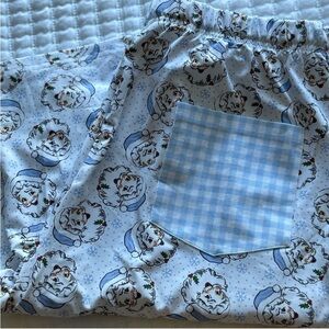 Listing for @_jessicahickman men’s sz L boutique Santa PJ pants
